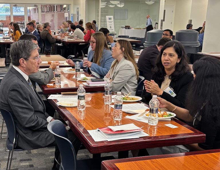 Dr. Joshi with colleagues from WVSOM at the WV BioSummit discussing new upcoming initiatives in translational research